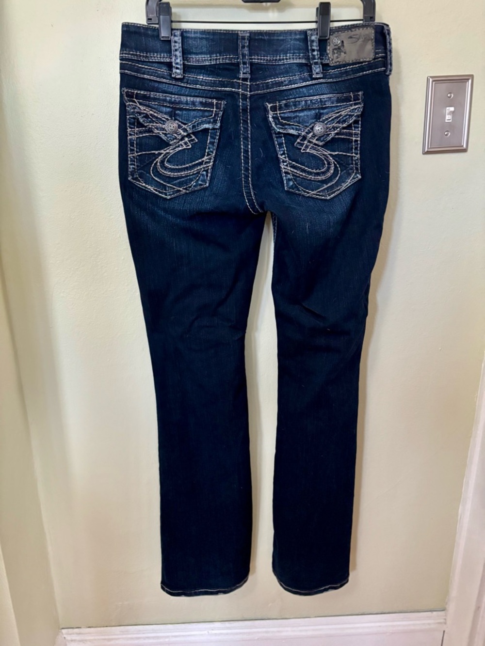 Silver “Suki” Jeans Dark Blue Bootcut Jeans with Embroidered Back Pockets